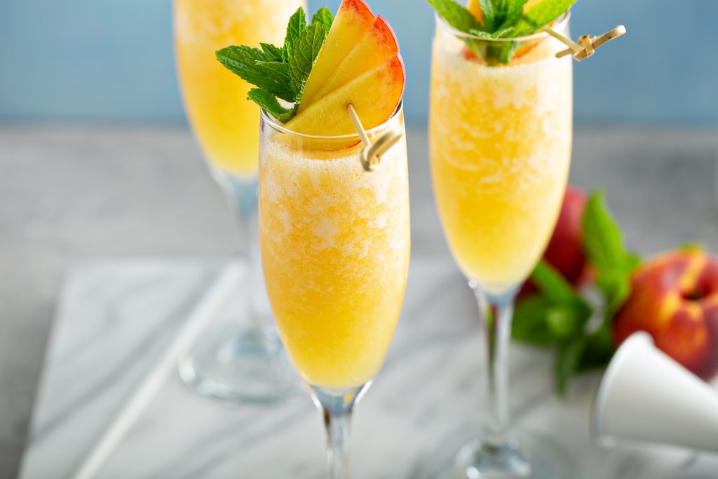 Summer,Time,Peach,Mimosa,Or,Bellini,In,Flute,Glasses,,Brunch